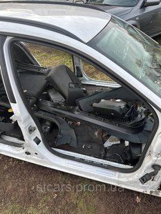 Уплотнитель двери пассажира Opel Astra H передней правой двери 7854 фото
